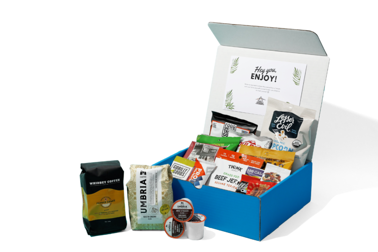 Remote Breakroom snack box showcasing a variety of snacks with options for coffee, including Caffe Umbria Ground Coffee, and single serve Kcups.