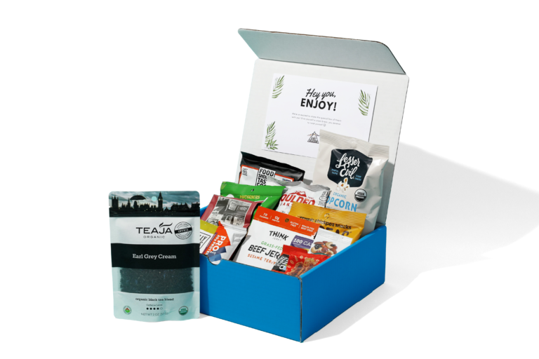 Remote Breakroom snack box with a variety of snacks, and Teaja Loose Leaf Tea.