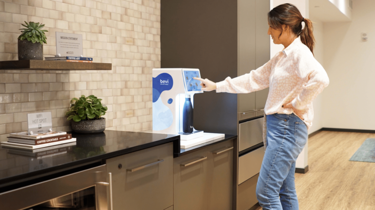 Bevi CT with girl filling up water